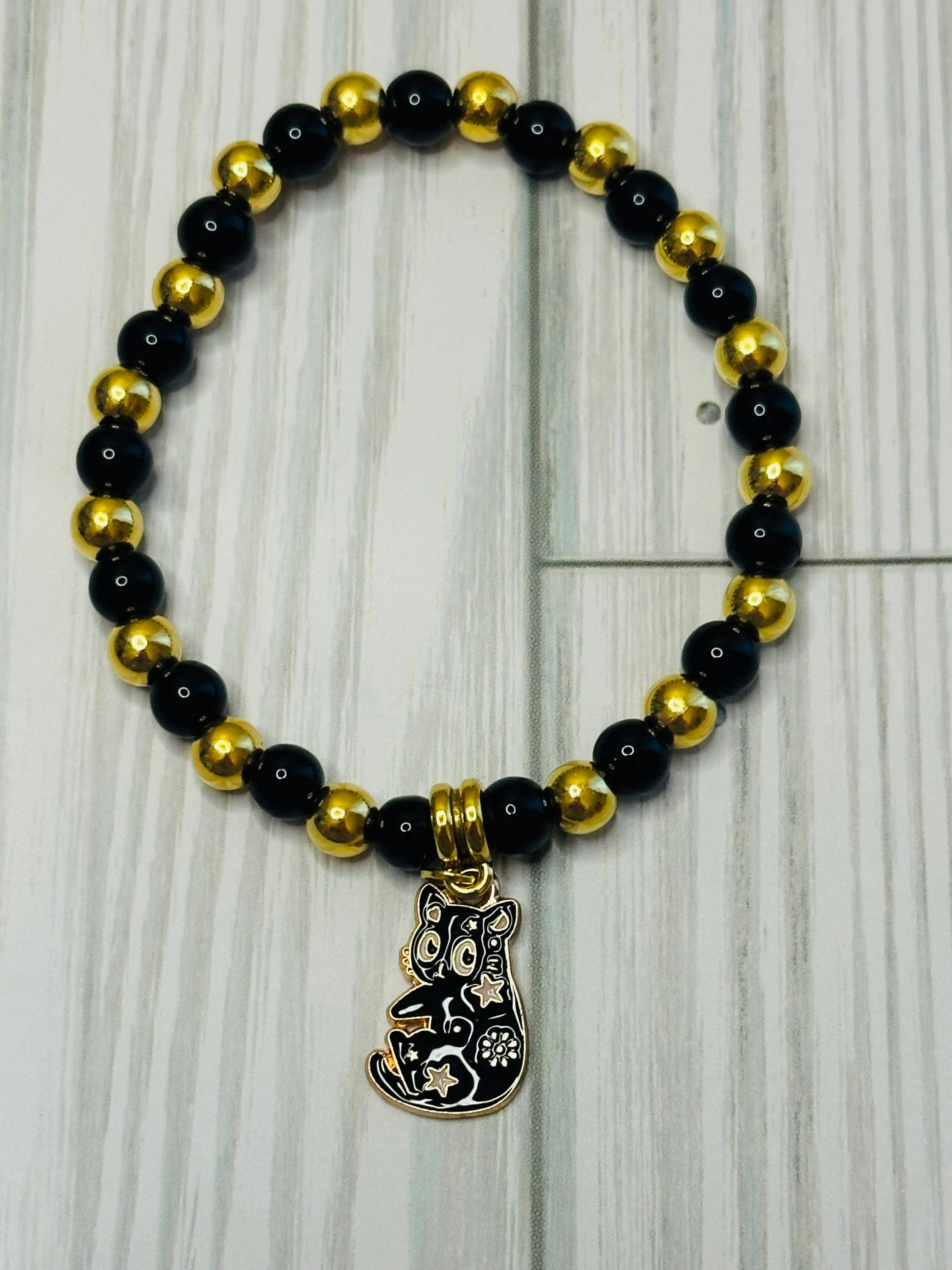 Black and Gold Floral Cat Bracelet